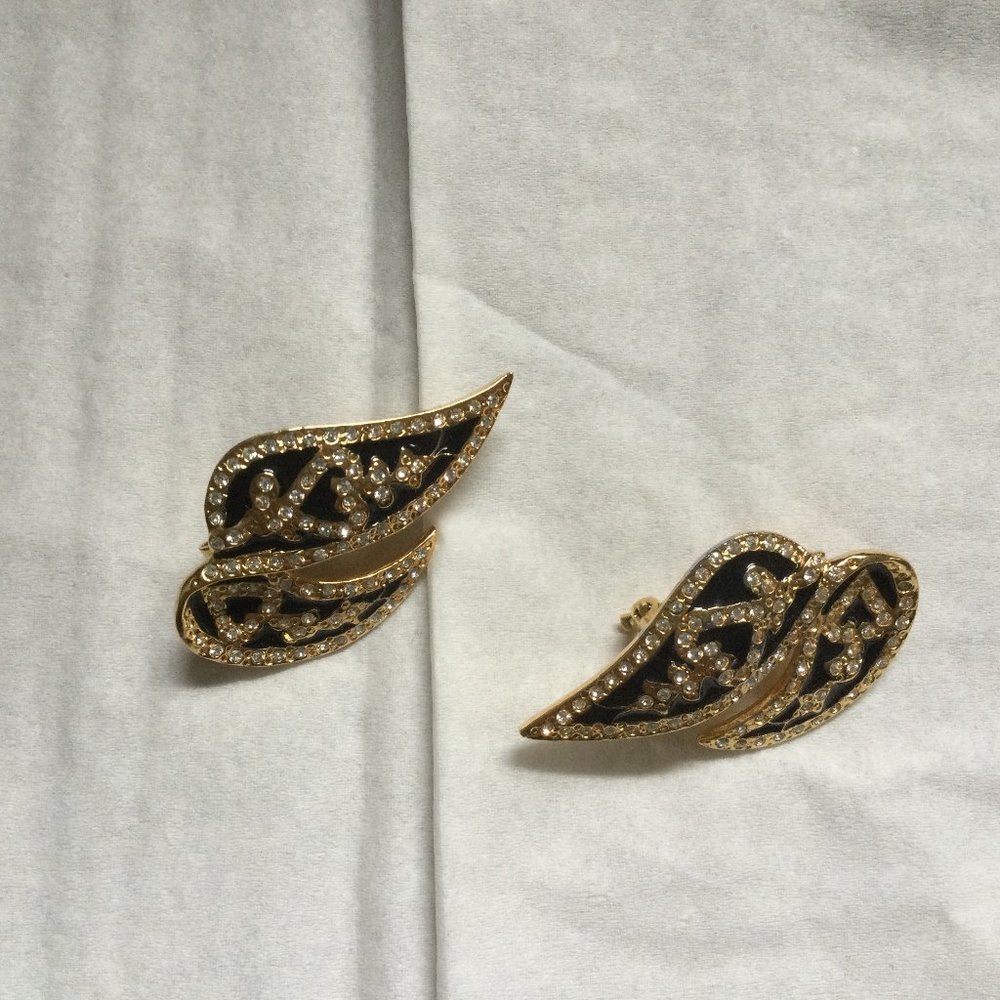 Butler clip on earrings gold tone black enamel signed